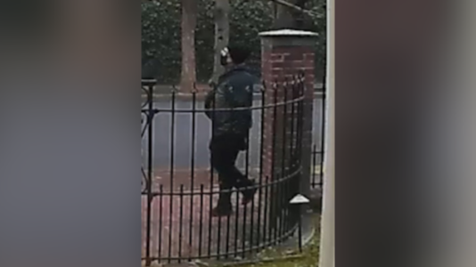 New FBI video shows man sought in Brown University shooting walking near police after attack