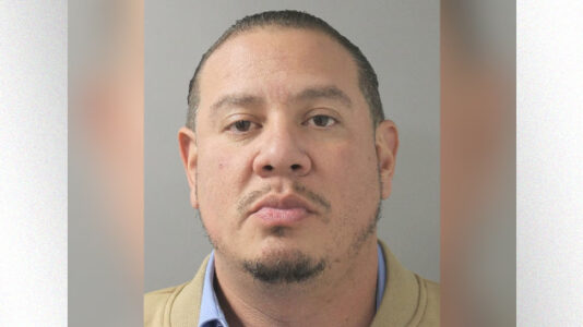 Father charged with murder in apparent case of mistaken identity, police say